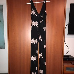 reformation black floral jumpsuit never worn